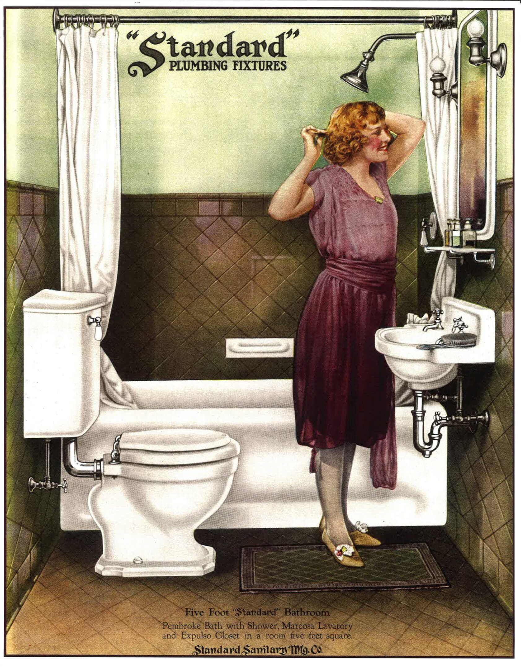 A woman in a bathroom with a toilet and sink